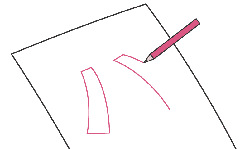 布にデザインの下書きをしているイメージ画像